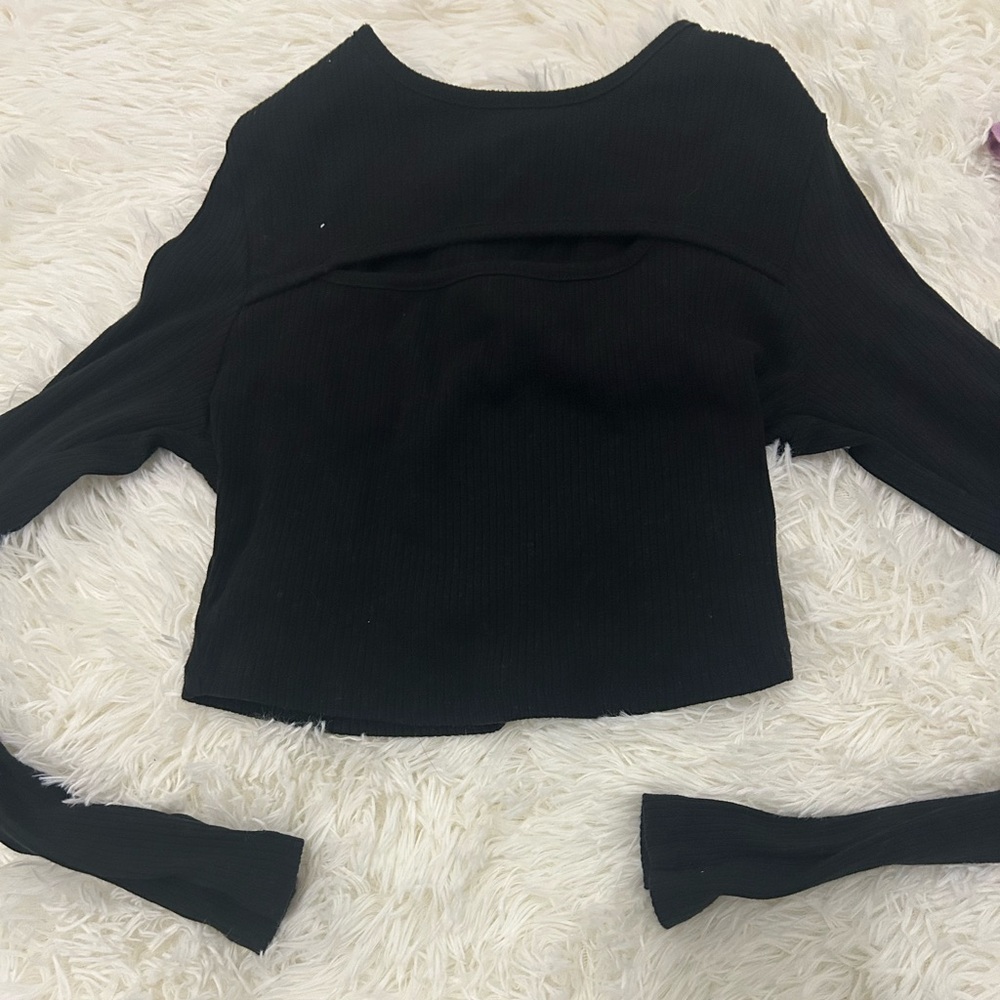 Long sleeve top with slit in front of